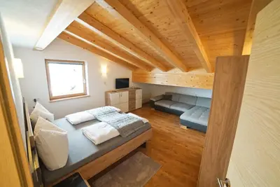 Ein Bett oder Betten in einem Zimmer der Unterkunft Landhaus Oberstockach