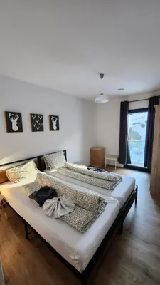 Ein Bett oder Betten in einem Zimmer der Unterkunft Mountain Chalet