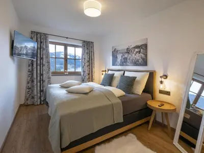 Ein Bett oder Betten in einem Zimmer der Unterkunft Appartement Stallfeldhof