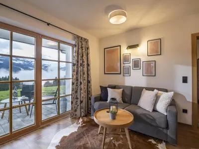 Ein Sitzbereich in der Unterkunft Appartement Stallfeldhof