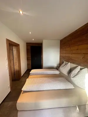 Ein Bett oder Betten in einem Zimmer der Unterkunft Apartments Oberkofler