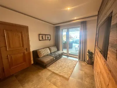 Ein Sitzbereich in der Unterkunft Apartments Oberkofler