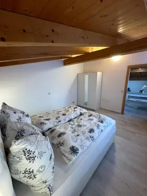 Ein Bett oder Betten in einem Zimmer der Unterkunft LEO Apart 2