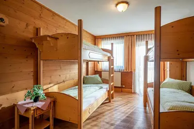 Ein Bett oder Betten in einem Zimmer der Unterkunft Berggasthof Rofan