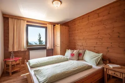 Ein Bett oder Betten in einem Zimmer der Unterkunft Berggasthof Rofan