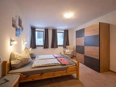 Ein Bett oder Betten in einem Zimmer der Unterkunft Krapfhof