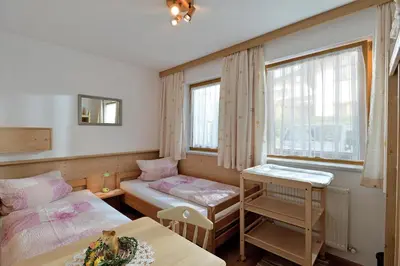 Ein Bett oder Betten in einem Zimmer der Unterkunft Ferienhaus Siglinde