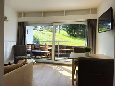 Ein Sitzbereich in der Unterkunft Alpen Studio Ellmau II