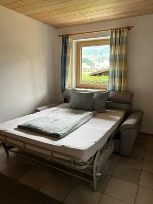 Ein Bett oder Betten in einem Zimmer der Unterkunft Apartment Troger