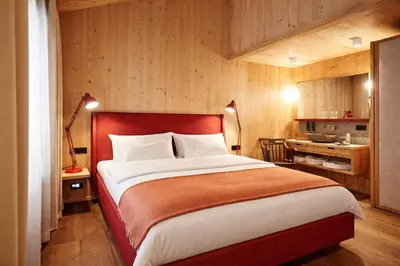 Ein Bett oder Betten in einem Zimmer der Unterkunft SportLodge BIKE Suite - by AlpenLuxus Collection