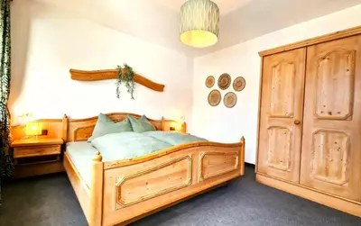 Ein Bett oder Betten in einem Zimmer der Unterkunft Appartment am Wiesinger Bichl