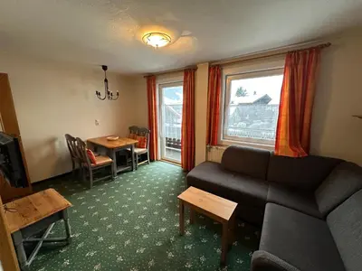 Ein Sitzbereich in der Unterkunft Apartments Pichler