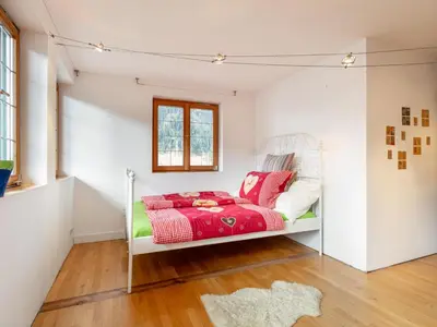Ein Bett oder Betten in einem Zimmer der Unterkunft Villa Kitz Kombination