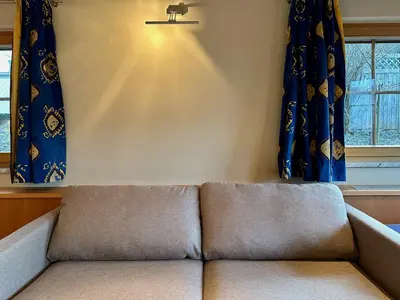 Ein Sitzbereich in der Unterkunft Apartments Max & Moritz
