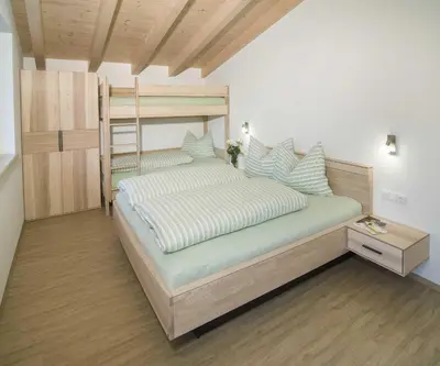 Ein Bett oder Betten in einem Zimmer der Unterkunft Appartement Gertraud