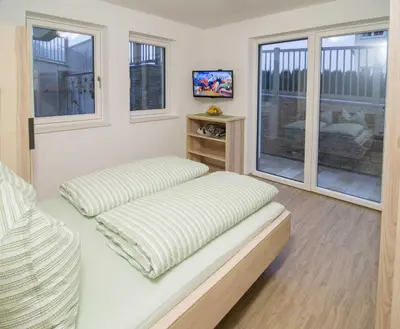 Ein Bett oder Betten in einem Zimmer der Unterkunft Appartement Gertraud