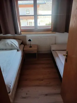 Ein Bett oder Betten in einem Zimmer der Unterkunft Ferienwohnung Eder