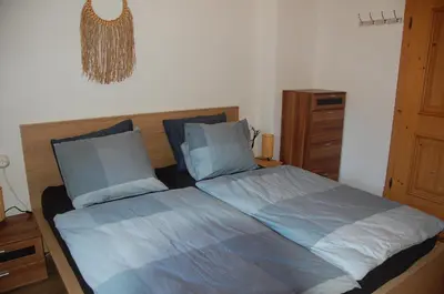 Ein Bett oder Betten in einem Zimmer der Unterkunft Haus hart im Zillertal 6 personen