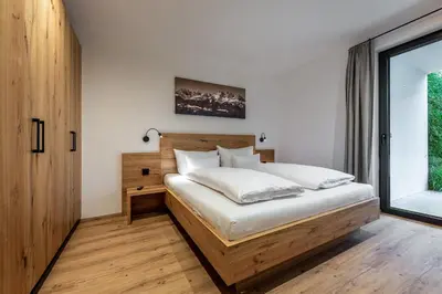 Ein Bett oder Betten in einem Zimmer der Unterkunft Waldnest