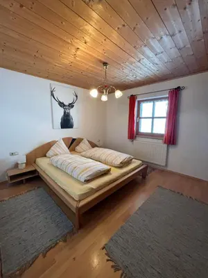 Ein Bett oder Betten in einem Zimmer der Unterkunft Zillerbruggerhof