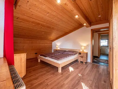 Ein Bett oder Betten in einem Zimmer der Unterkunft Ferienwohnung Zillertal - Schwemberger