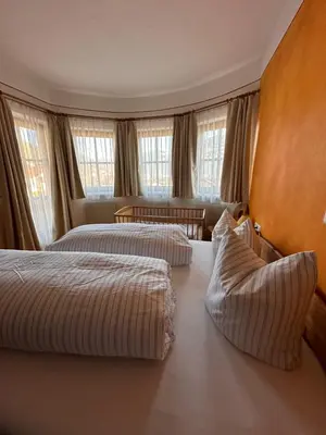 Ein Bett oder Betten in einem Zimmer der Unterkunft Villa Marianne