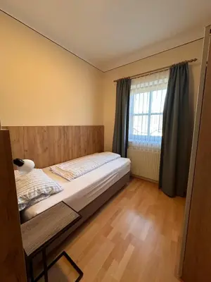 Ein Bett oder Betten in einem Zimmer der Unterkunft Villa Marianne