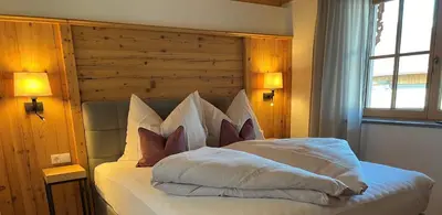 Ein Bett oder Betten in einem Zimmer der Unterkunft Honsahof
