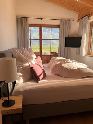 Ein Bett oder Betten in einem Zimmer der Unterkunft Honsahof