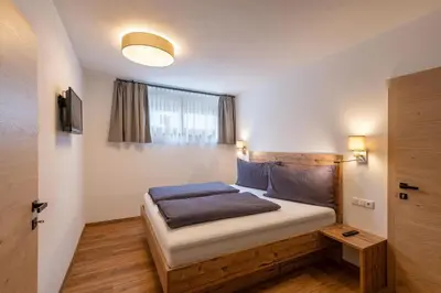 Ein Bett oder Betten in einem Zimmer der Unterkunft Appartement Auwald