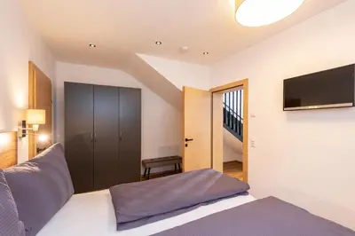Ein Bett oder Betten in einem Zimmer der Unterkunft Appartement Auwald