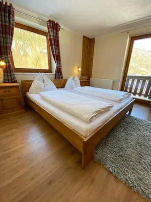 Ein Bett oder Betten in einem Zimmer der Unterkunft Haus Alpenrose