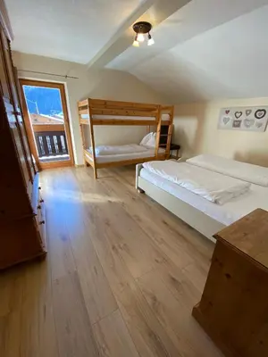Ein Bett oder Betten in einem Zimmer der Unterkunft Haus Alpenrose