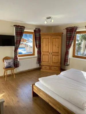 Ein Bett oder Betten in einem Zimmer der Unterkunft Haus Alpenrose