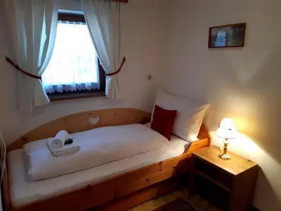 Ein Bett oder Betten in einem Zimmer der Unterkunft Haus Reason