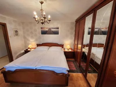 Ein Bett oder Betten in einem Zimmer der Unterkunft Ferienwohnung Söllner