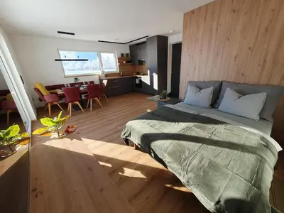 Ein Bett oder Betten in einem Zimmer der Unterkunft Zillernest Apartment