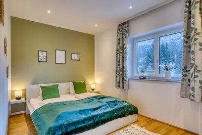 Ein Bett oder Betten in einem Zimmer der Unterkunft NA-Home Kitzbühel