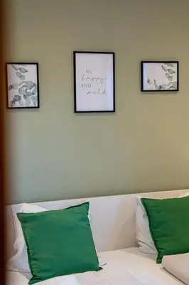 Ein Bett oder Betten in einem Zimmer der Unterkunft NA-Home Kitzbühel