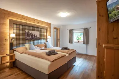 Ein Bett oder Betten in einem Zimmer der Unterkunft Ferienwohnung Schwabegghof