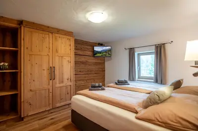Ein Bett oder Betten in einem Zimmer der Unterkunft Ferienwohnung Schwabegghof