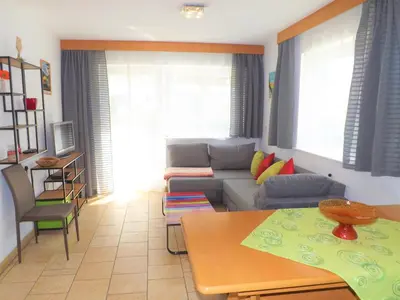 Ein Sitzbereich in der Unterkunft Apartments Scheffau