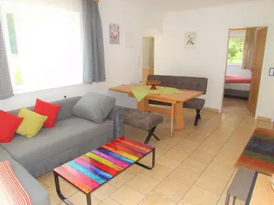 Ein Sitzbereich in der Unterkunft Apartments Scheffau