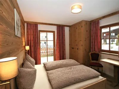 Ein Bett oder Betten in einem Zimmer der Unterkunft Holiday Home Zauberwinkel-3 by Interhome