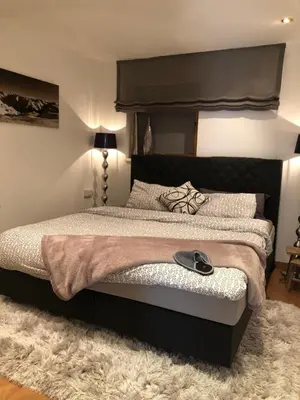 Ein Bett oder Betten in einem Zimmer der Unterkunft Alpbach 646