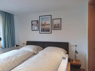 Ein Bett oder Betten in einem Zimmer der Unterkunft Apartment Sonnenwinkl