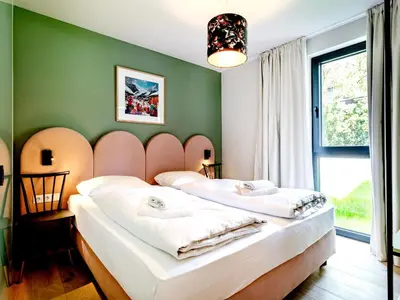 Ein Bett oder Betten in einem Zimmer der Unterkunft Lukasfeld 9 Top Lisi