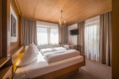 Ein Bett oder Betten in einem Zimmer der Unterkunft Gästehaus Rauch