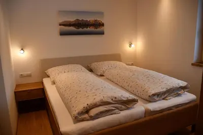 Ein Bett oder Betten in einem Zimmer der Unterkunft Appartement Jochblick