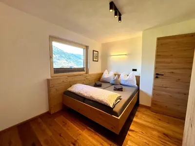 Ein Bett oder Betten in einem Zimmer der Unterkunft Appartement Hirner